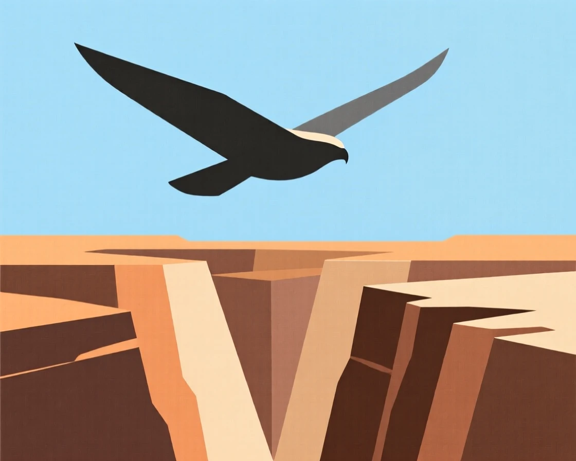 A hawk soaring above a canyon
