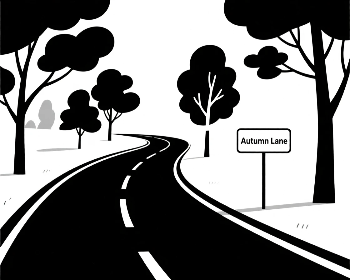 A quiet countryside road lined with autumn trees.