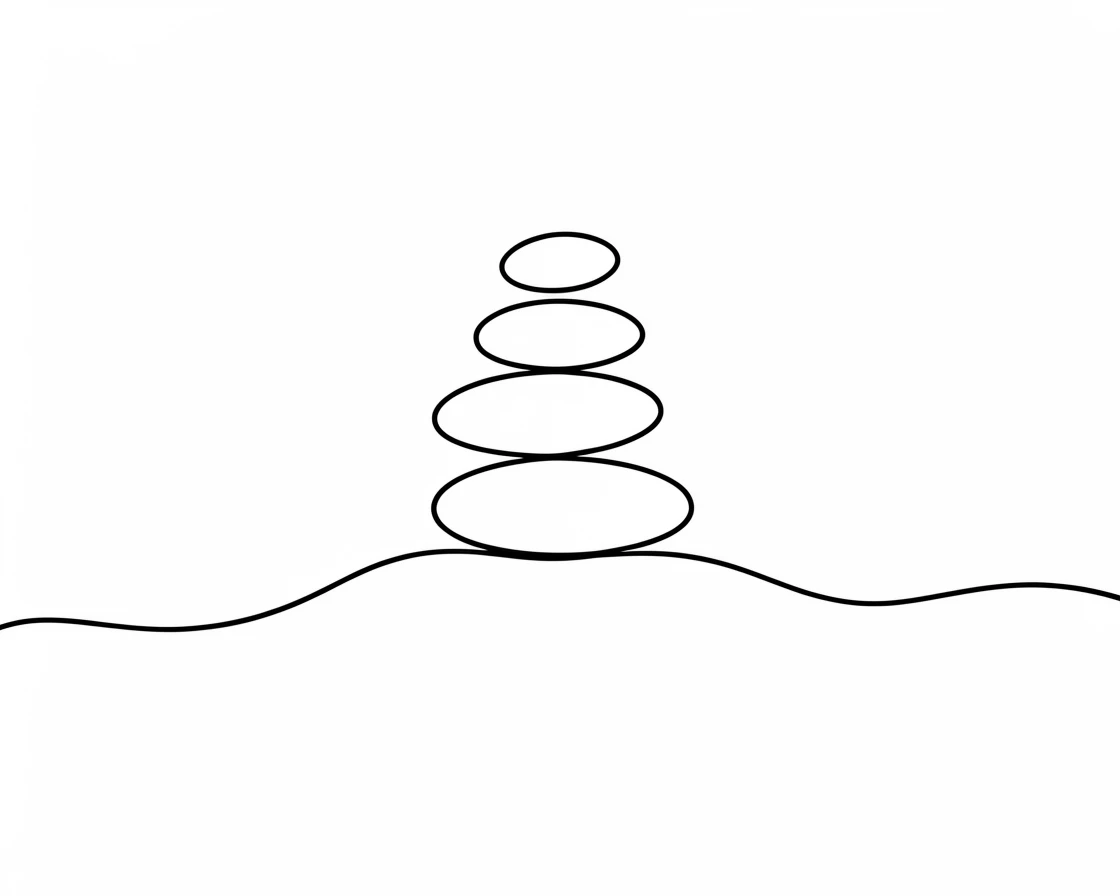 A stack of stones balanced precariously on a riverbank, representing balance