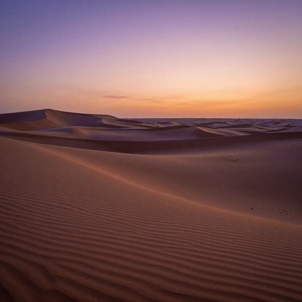 A desert sunset painting sand dunes in shades of purple and orange