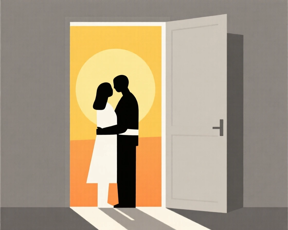 A couple embracing in a sunlit doorway