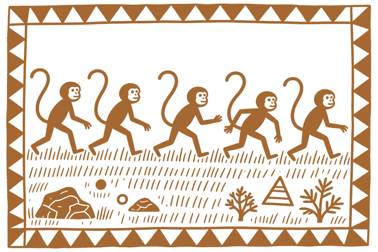 A group of monkeys wandering across an open grassland.